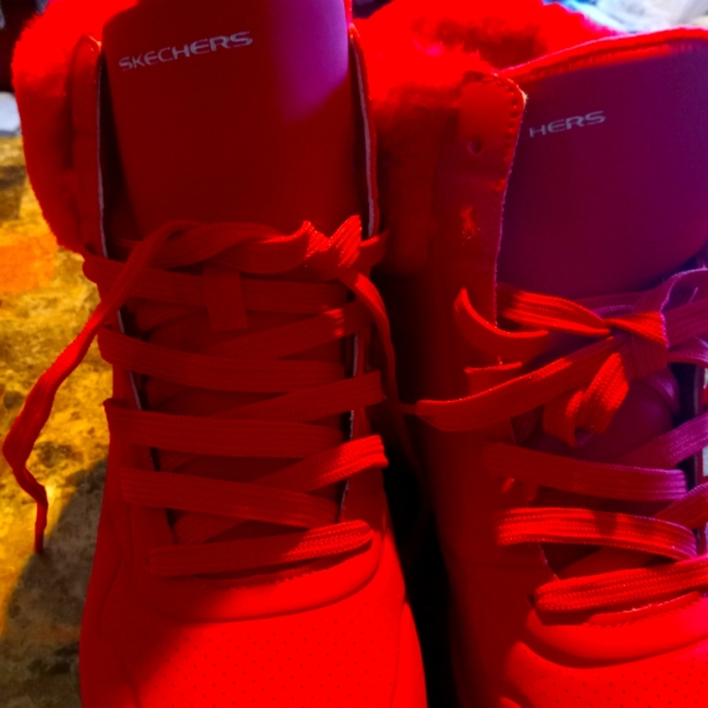 Red faux fur sketches high top tennis shoes